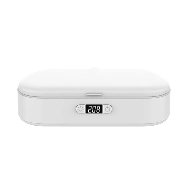 White portable UV steriliser and wireless charging box with aromatherapy function on a desktop