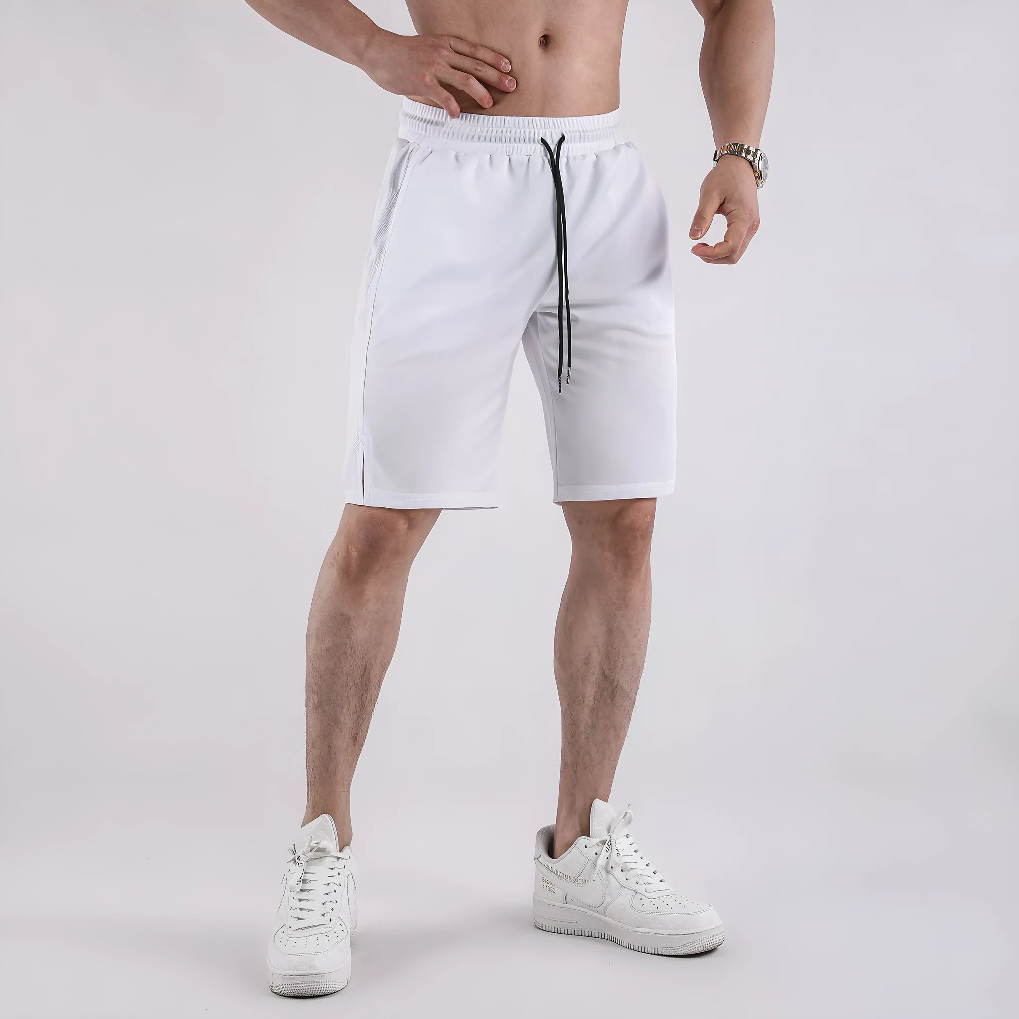 Men's black quick-drying mesh shorts with loose capri pants fit and mid-waist design