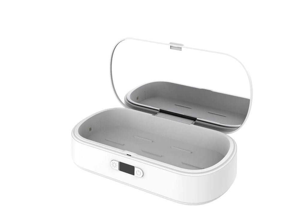 White portable UV steriliser and wireless charging box with aromatherapy function on a desktop