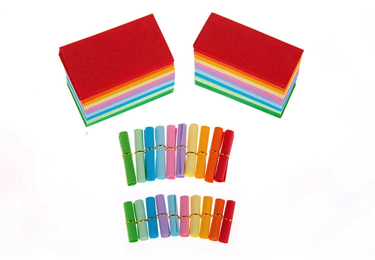 Multi-coloured mini paper scrolls with metal eyelets in 3x7cm, 4x7cm, 5x5cm, and 7x7cm sizes for drift bottle messages