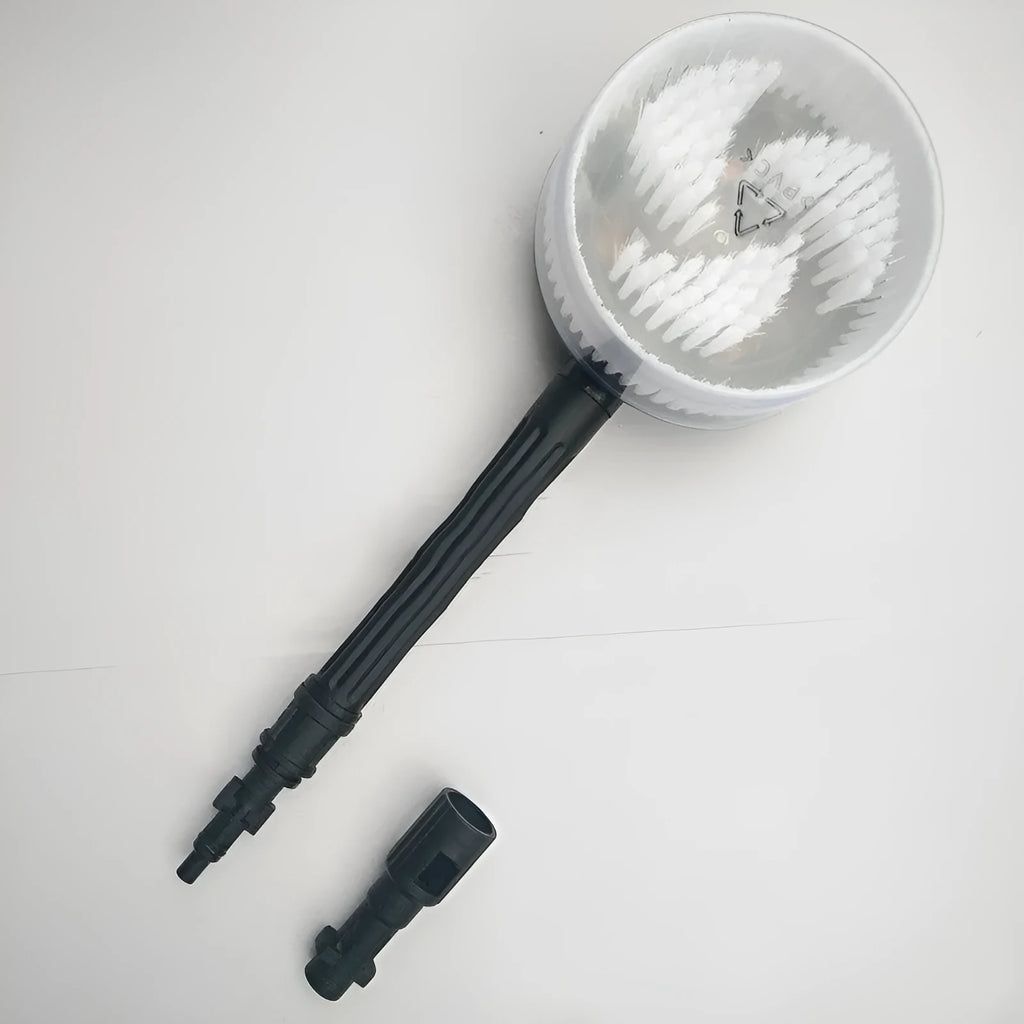 Automatic car washing rotating brush with water gun and three nozzle options on a car surface