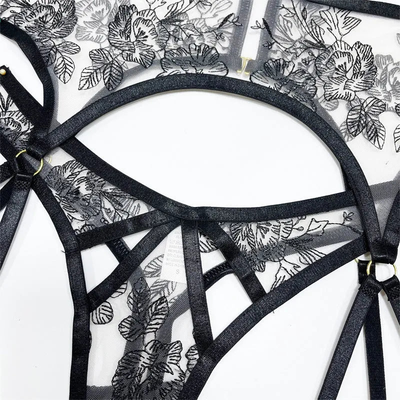 Black women's lace mesh three-piece clothing set with floral print, showing top, trousers, and waist cincher.
