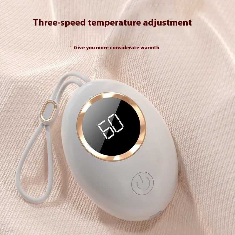USB digital display hand warmer in one of six colour options: blue, green, white, or pink.