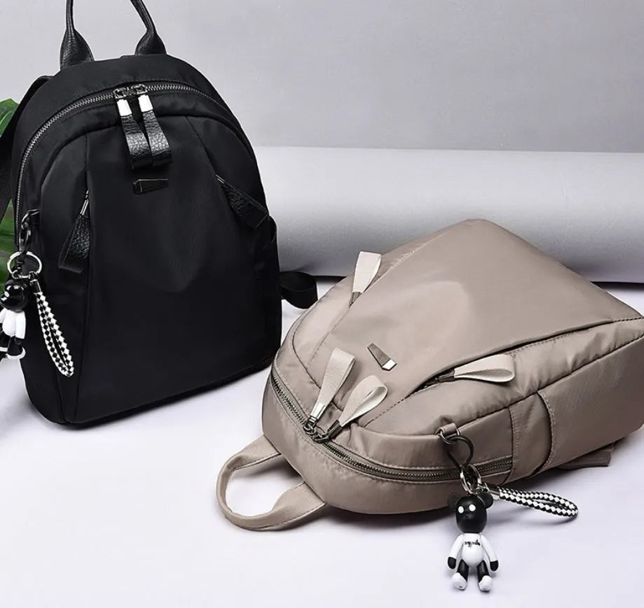 Medium Oxford cloth rucksack in black with internal phone and ID compartments