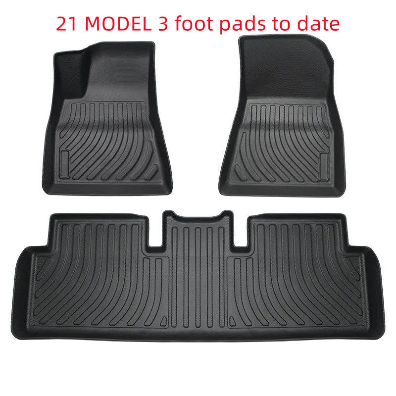 Custom rubber floor mats for Tesla cars with a textured TPE driver footrest section.