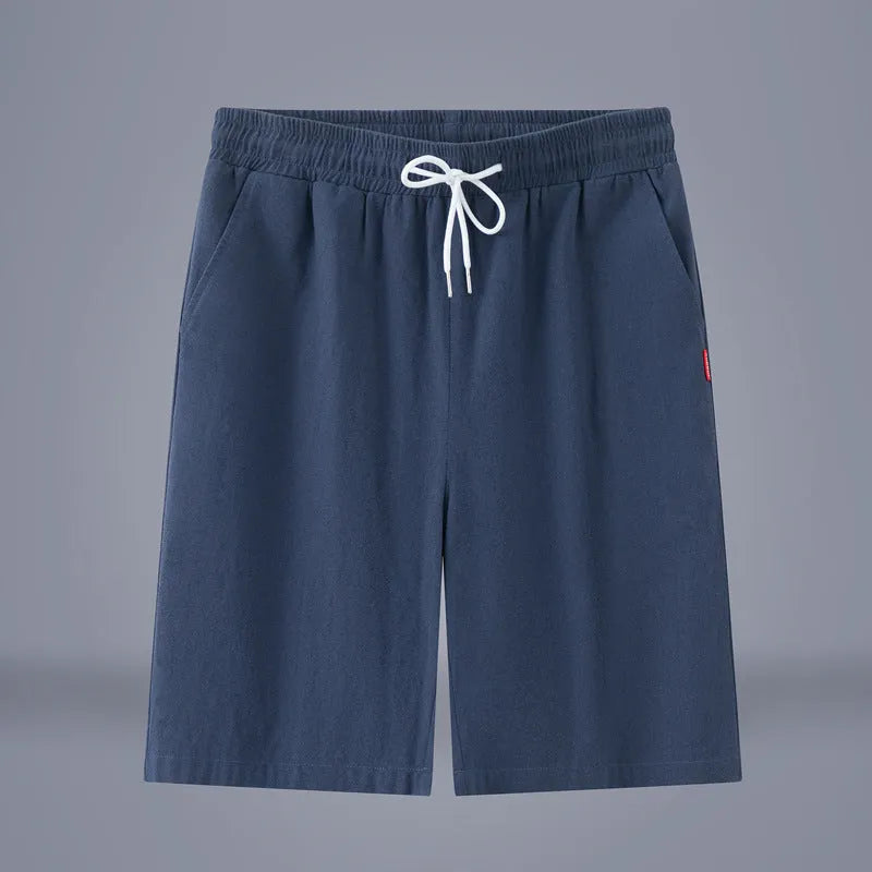 Solid colour cotton linen cropped summer pants with a drawstring waist on a hanger.