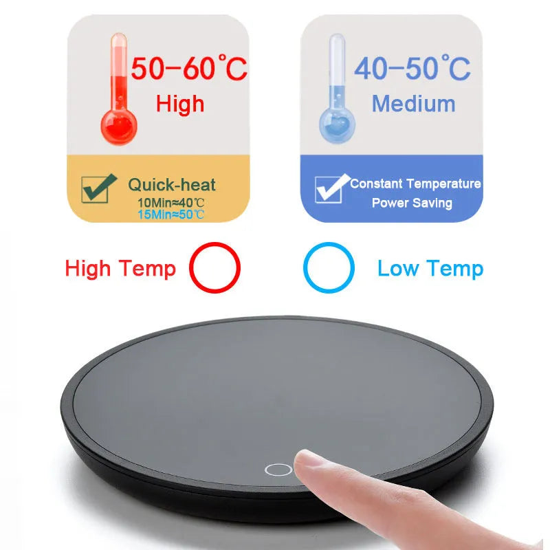 Black coffee cup warmer plate with temperature switch on desk next to mug
