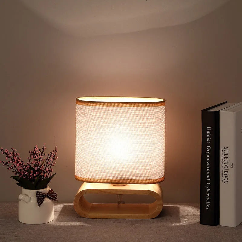 Nordic Japanese bedside table lamp with rubber wood holder, Φ170mm by H230mm, on a nightstand