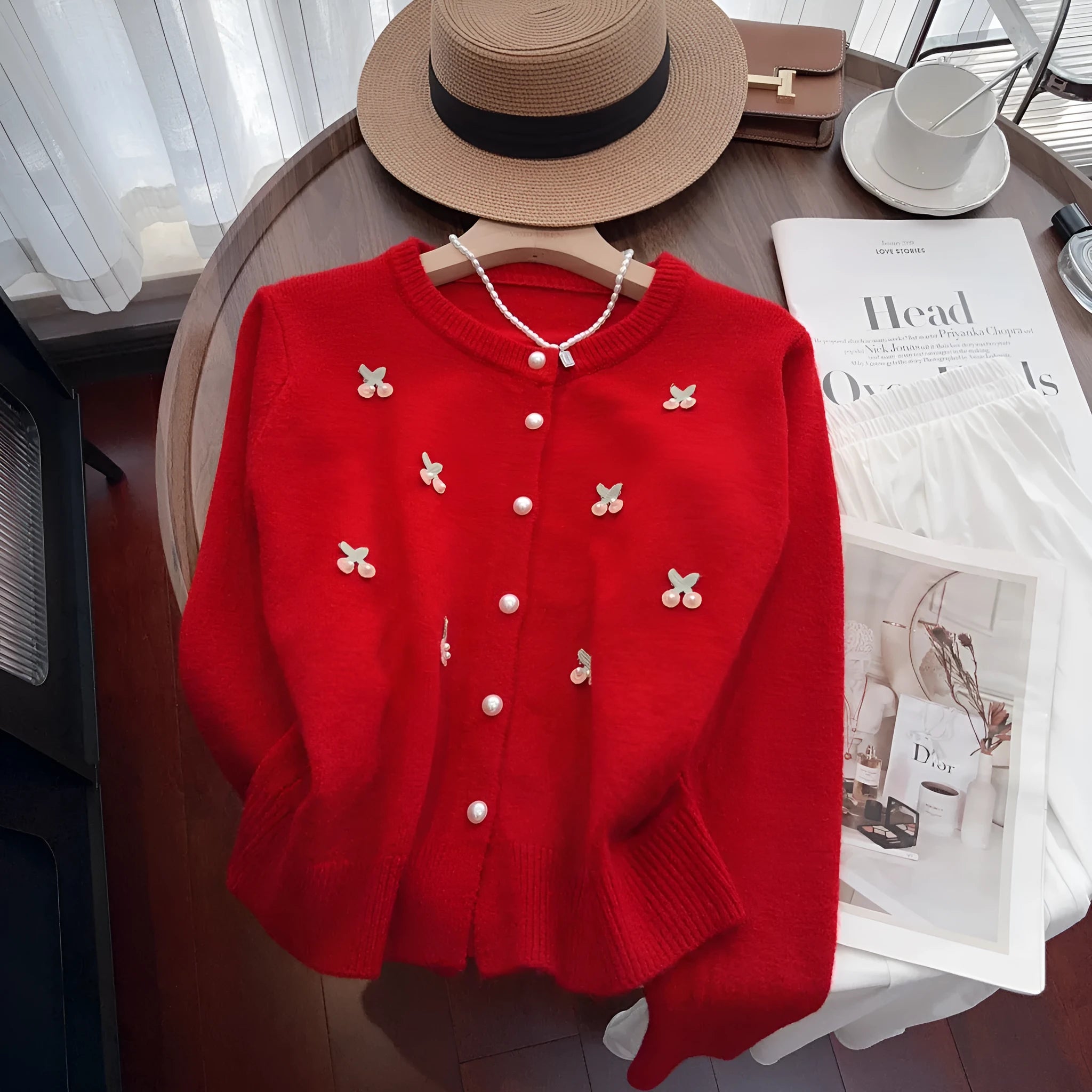 Women's beaded cardigan sweater in free size available in four colours with round neck design