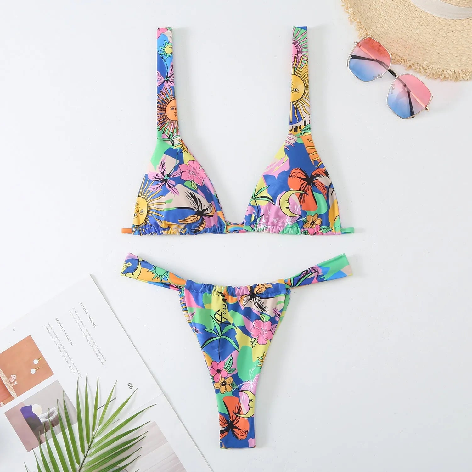 Women's floral print bikini swimsuit in blue, rose red, sky blue or white.