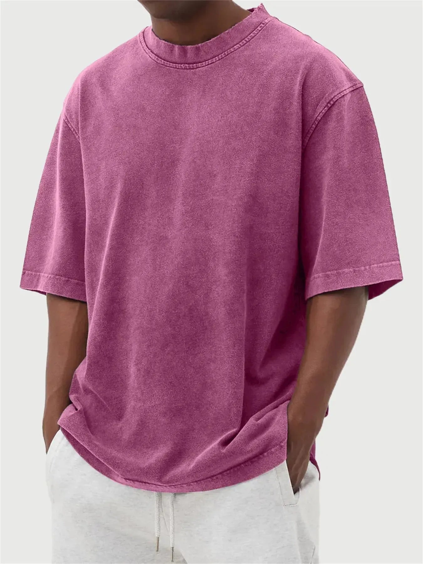 Men's loose fit distressed stone wash pullover t-shirt in solid colours like army green and blue.