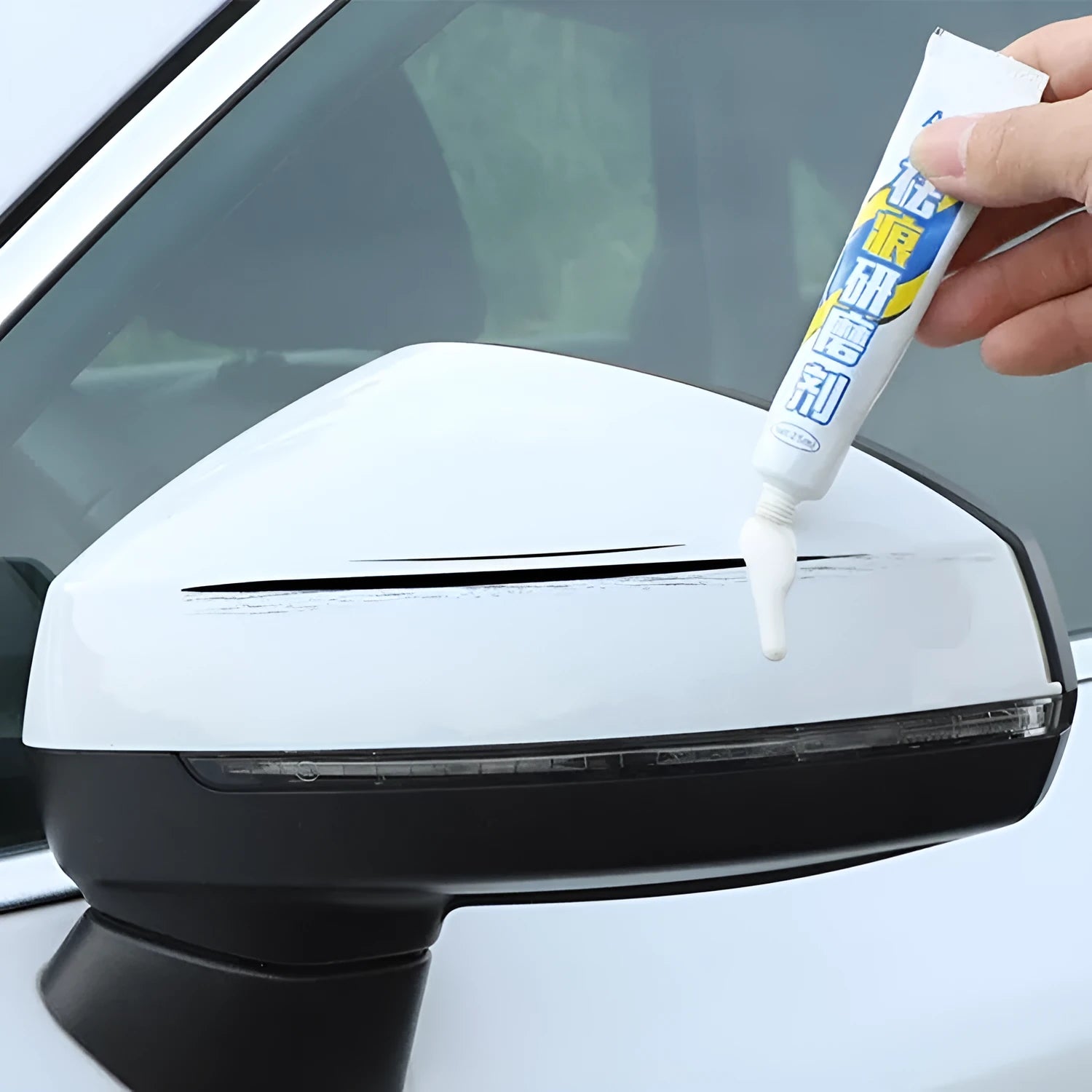 Automotive paint repair pen kit with touch-up paint, scratch wax, sponge and sandpaper