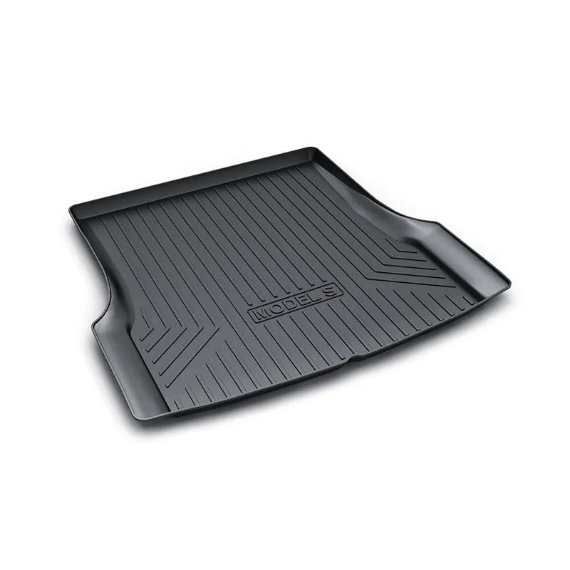 Custom rubber floor mats for Tesla cars with a textured TPE driver footrest section.