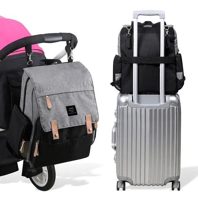 LAND Mommy large Oxford cloth diaper backpack with changing mat in various colours.