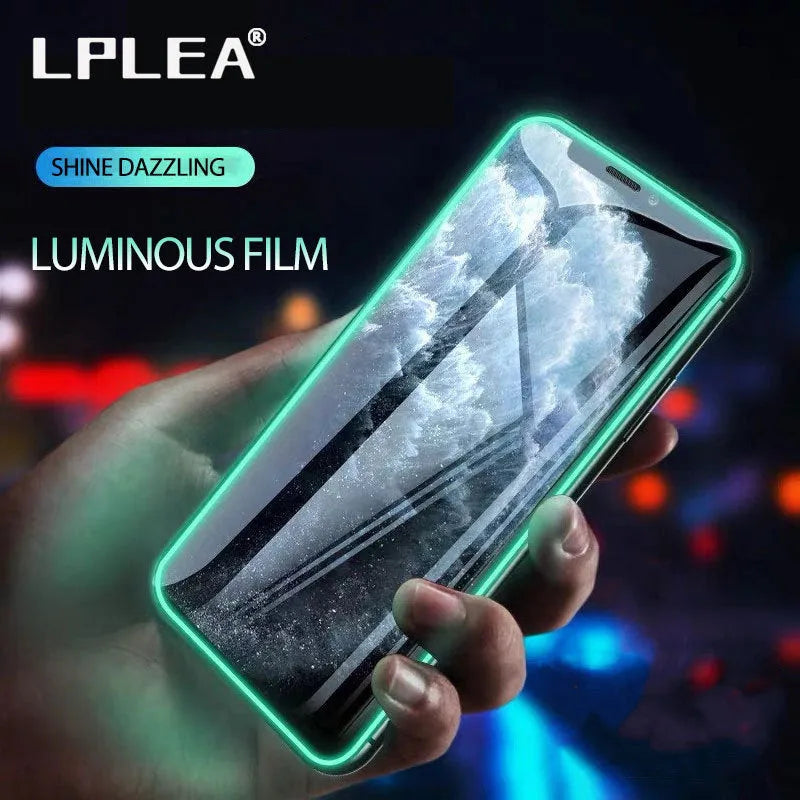 Luminous full cover tempered glass screen protector glowing on an iPhone in a dark setting.