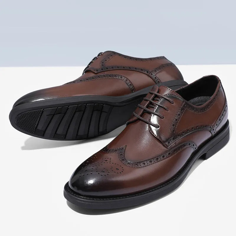 Men's black and brown brogue shoes with traditional wingtip detailing for business wear