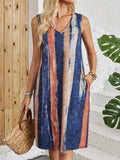 V-neck sleeveless dress with striped colour block pattern and mid waist fit