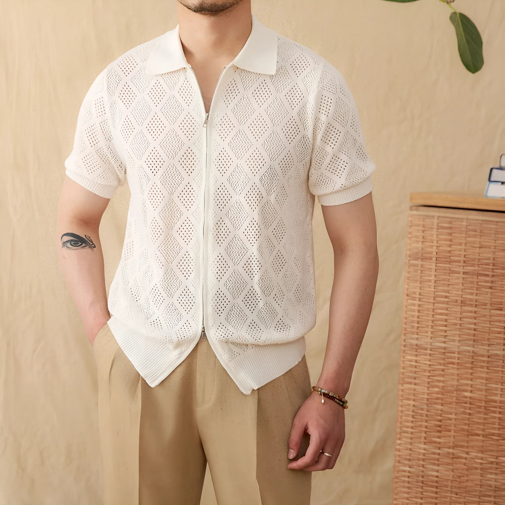 Light brown cotton short sleeve cardigan with lapel collar and front zipper closure on hanger