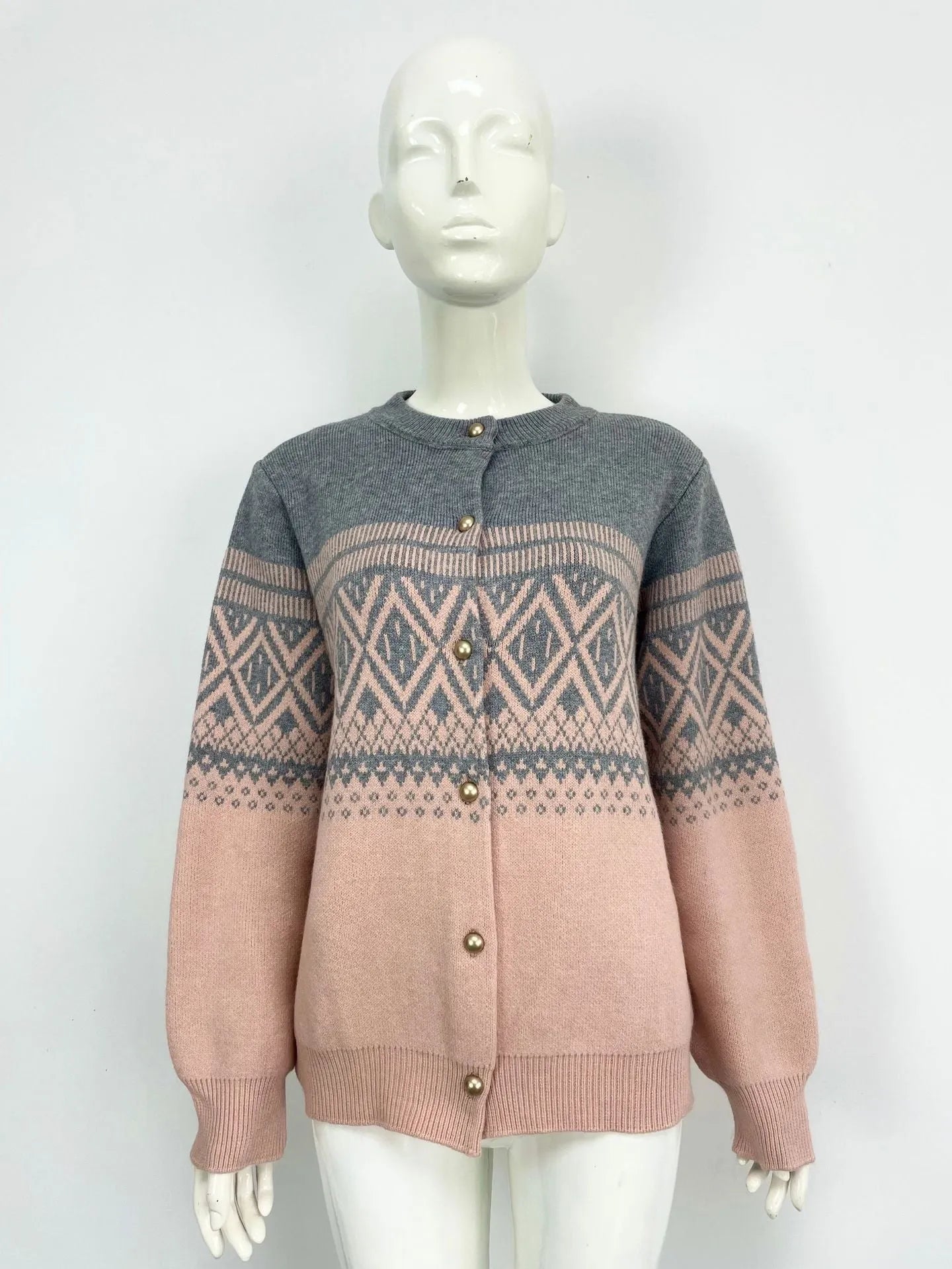 Women's red alpaca wool cardigan with grey diamond knit pattern and long sleeves