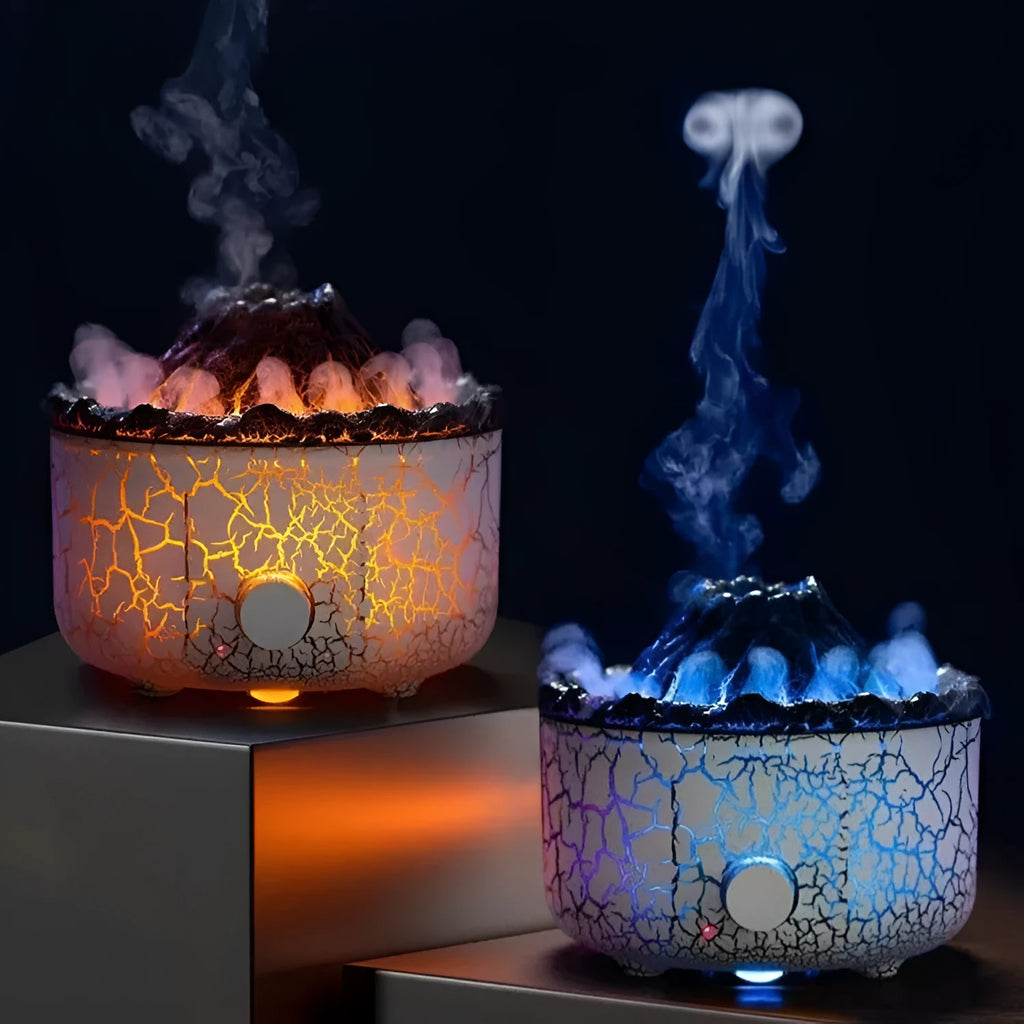 Volcano humidifier with LED lights and mist creating a fiery flame effect, column-shaped plastic body on a table