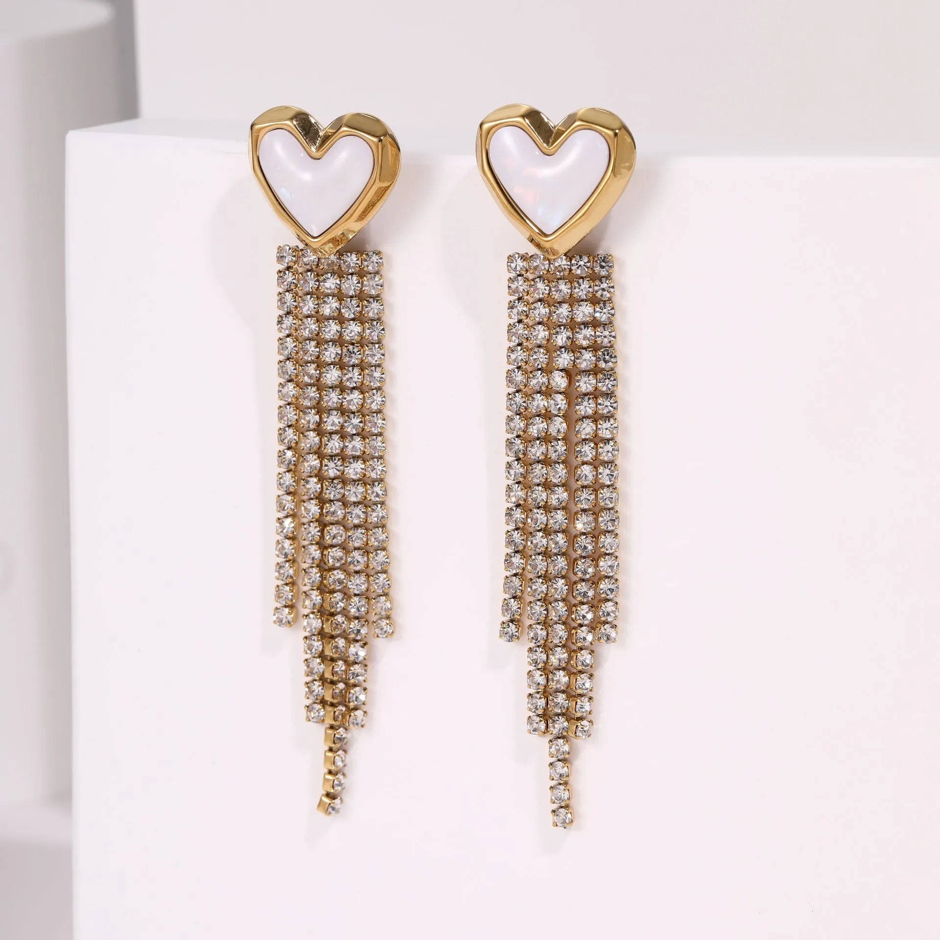 Stainless steel heart-shaped earrings with geometric star detailing and 18K gold electroplated finish