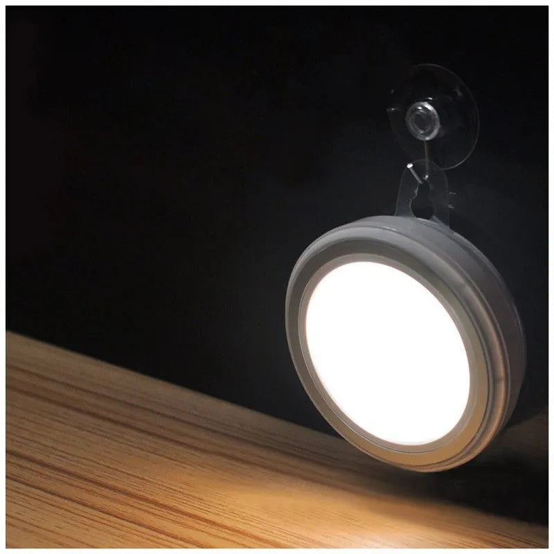Smart body motion sensor LED night light with 80mm diameter showing warm and white light options