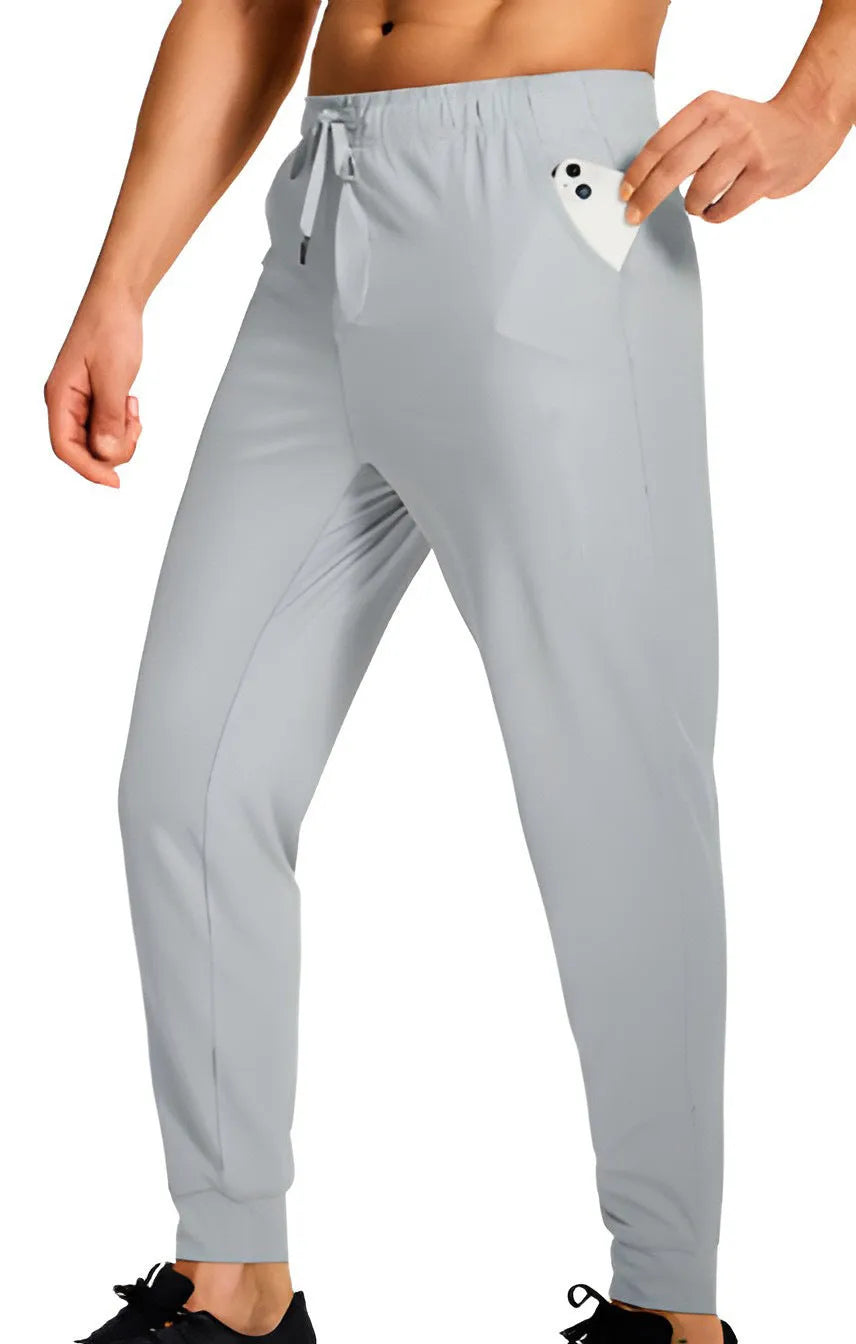Men's loose fit casual trousers in solid colour with elastic waistband, available in multiple sizes