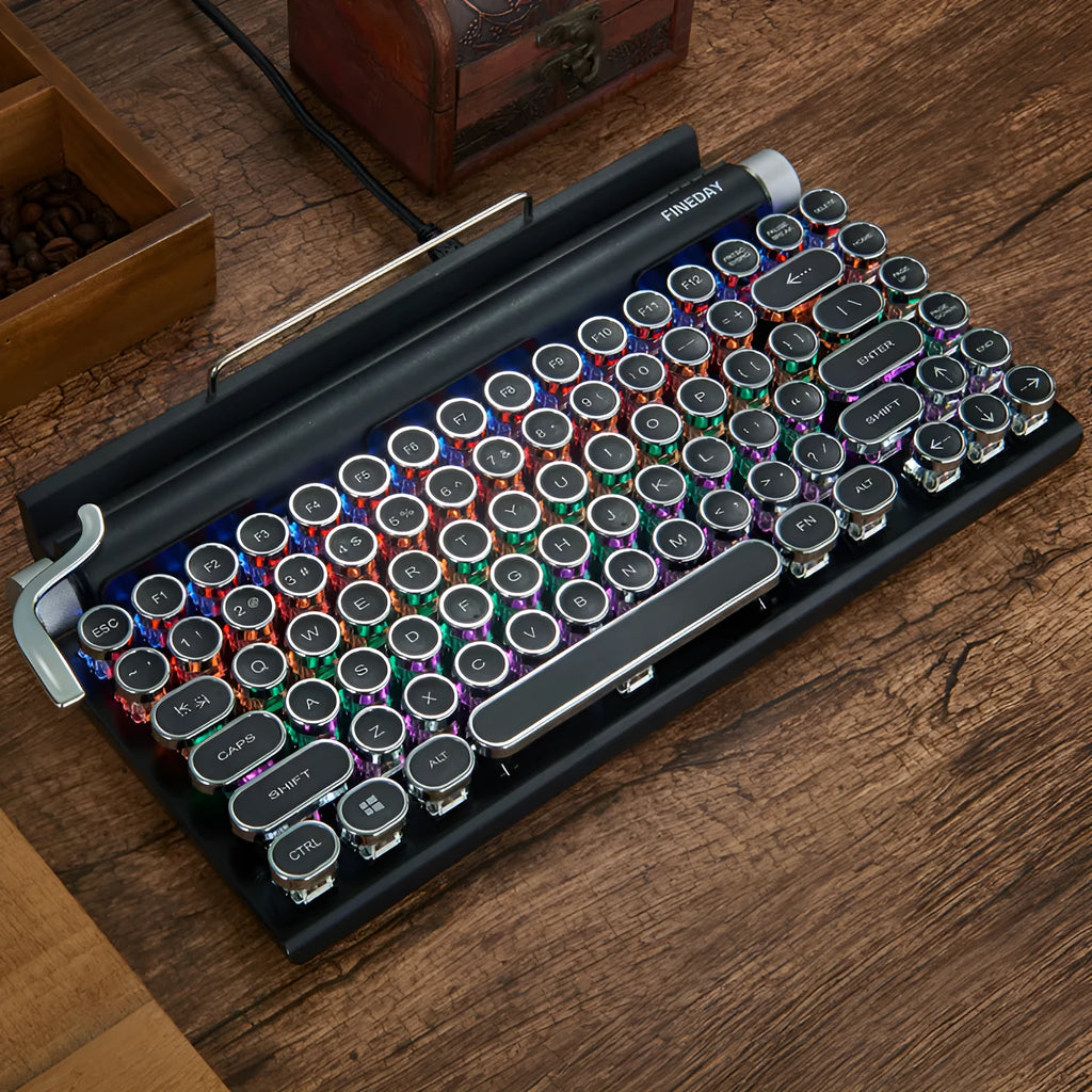 Black retro typewriter style mechanical keyboard with backlit keys on a desk
