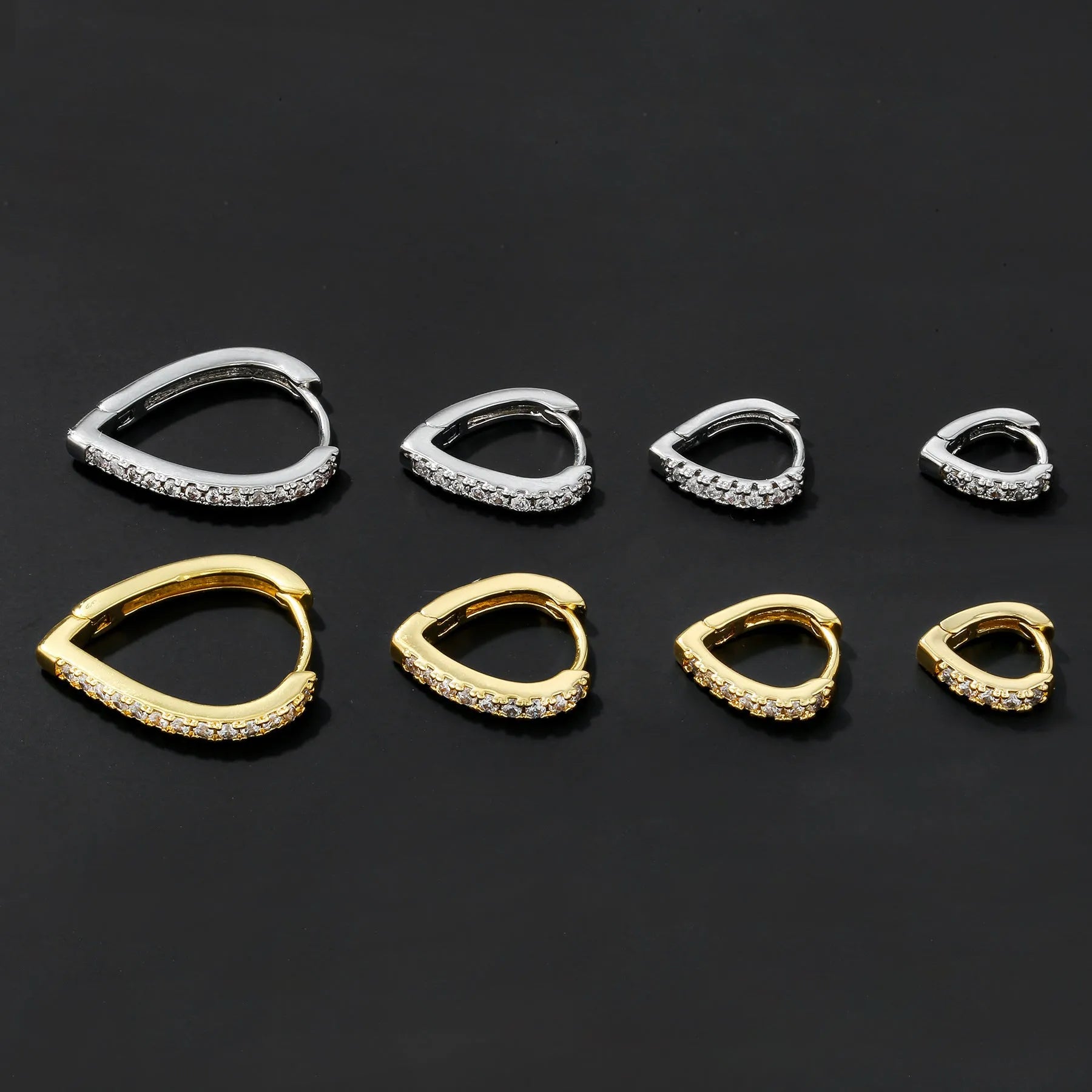 Geometric heart-shaped women's ear clip with electroplated gold finish on copper base material