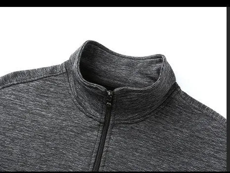 Men's black casual zip-up jacket with a stand-up collar on a hanger