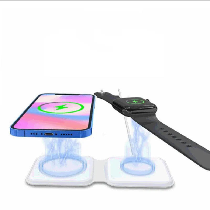 White foldable magnetic wireless charger charging two phones simultaneously on angled stand
