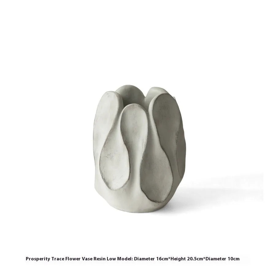 Irregular ceramic vase for flower arrangements in high style or low style profile