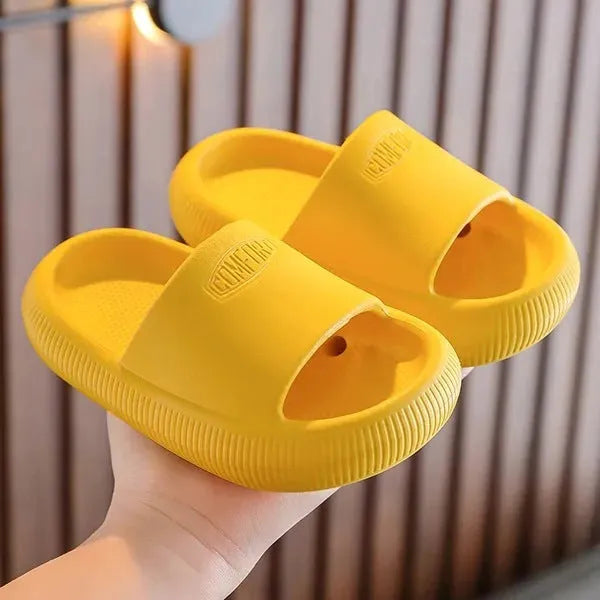 Children's EVA slippers with non-slip soles in mixed colour options showing size range