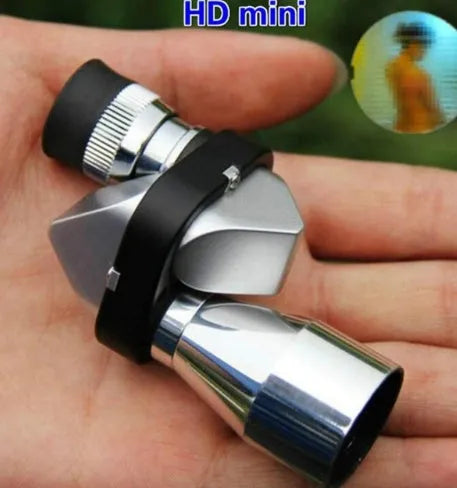 Compact aluminium alloy pocket monocular telescope with 8x20 magnification on a cloth next to its canvas carry bag.