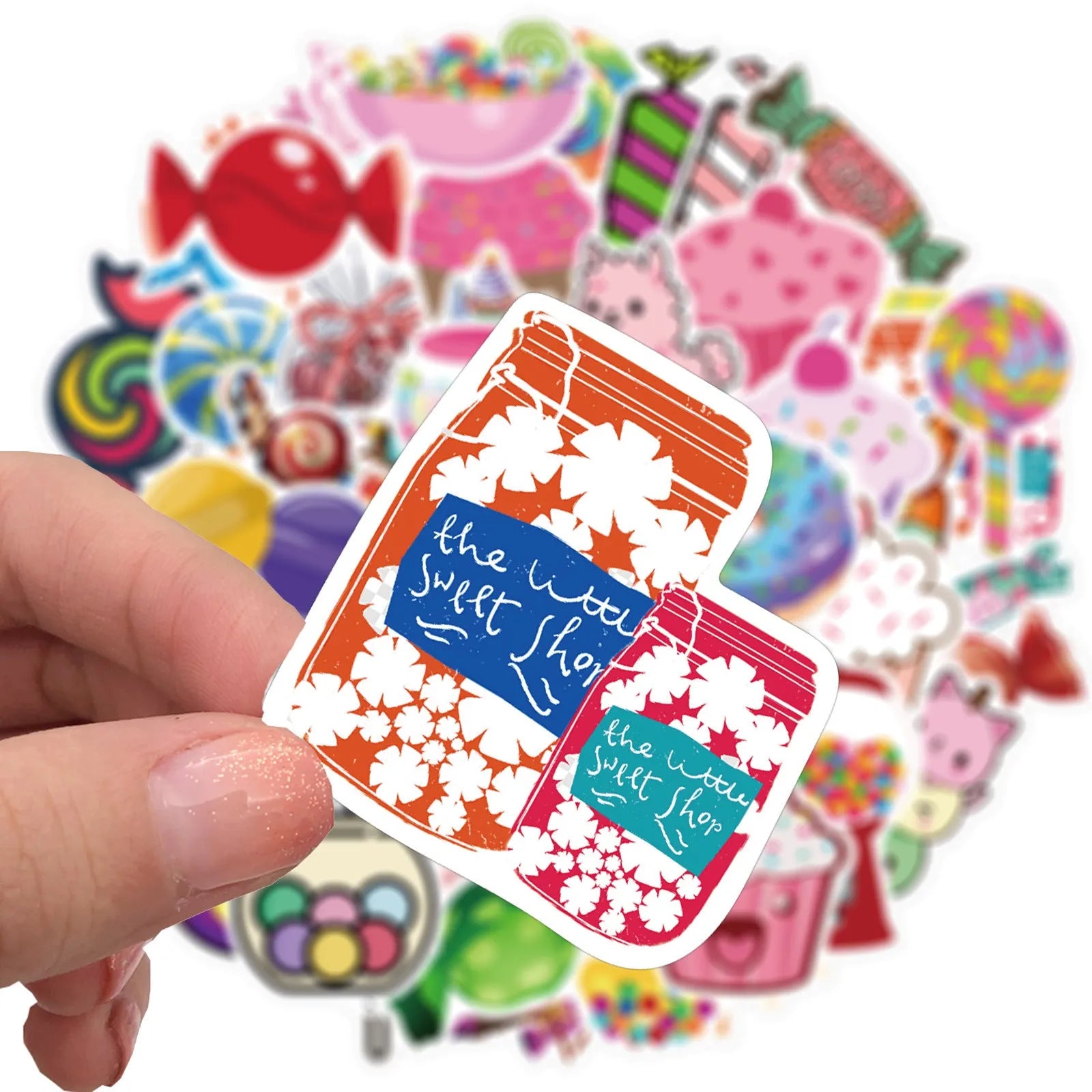 Assortment of colourful candy graffiti and cartoon stickers from a 50-piece pack on a white background.