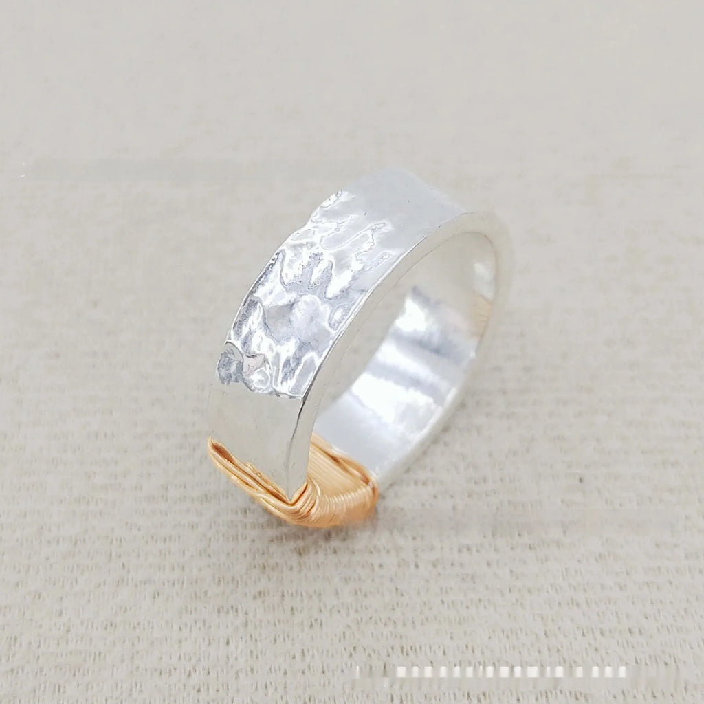 Copper bracelet with vintage ring design featuring irregular coil pattern in silver golden colour