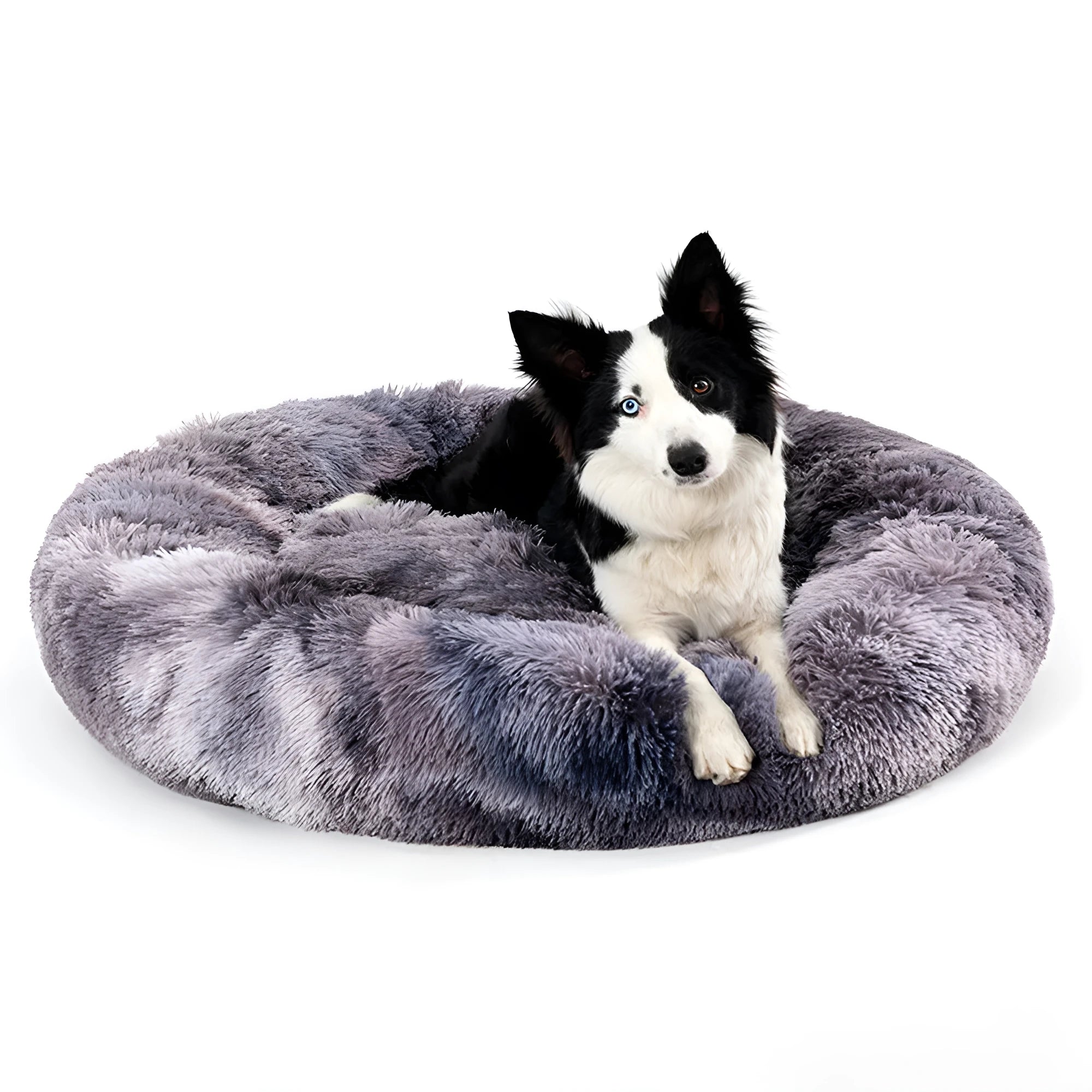 Fluffy long plush donut-shaped pet bed for dogs and cats on a wooden floor.