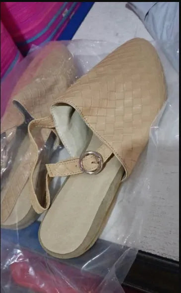 Women's buckle flat sandals with pointed toe in multiple colour options showing adjustable strap