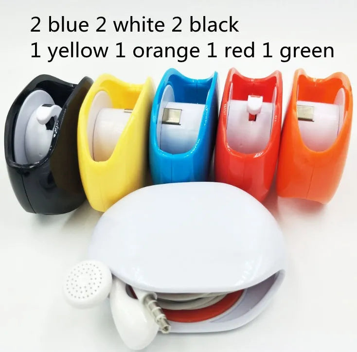 Automatic earphone retractor winder with telescopic reel and small storage box.