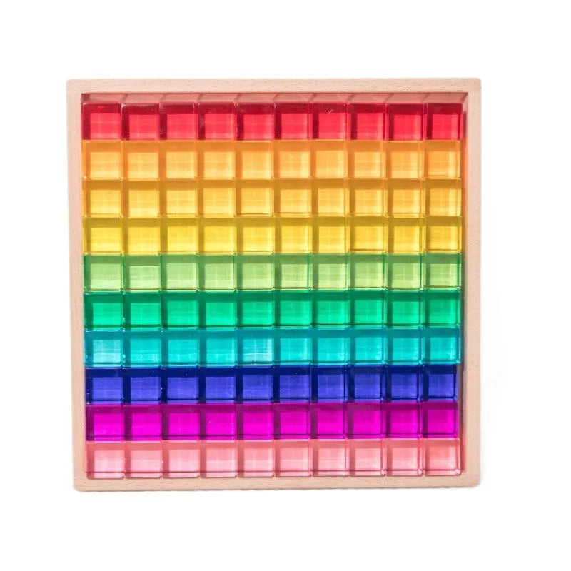 Wooden building block set with clear acrylic high permeability tiles on a tray, 29cm square