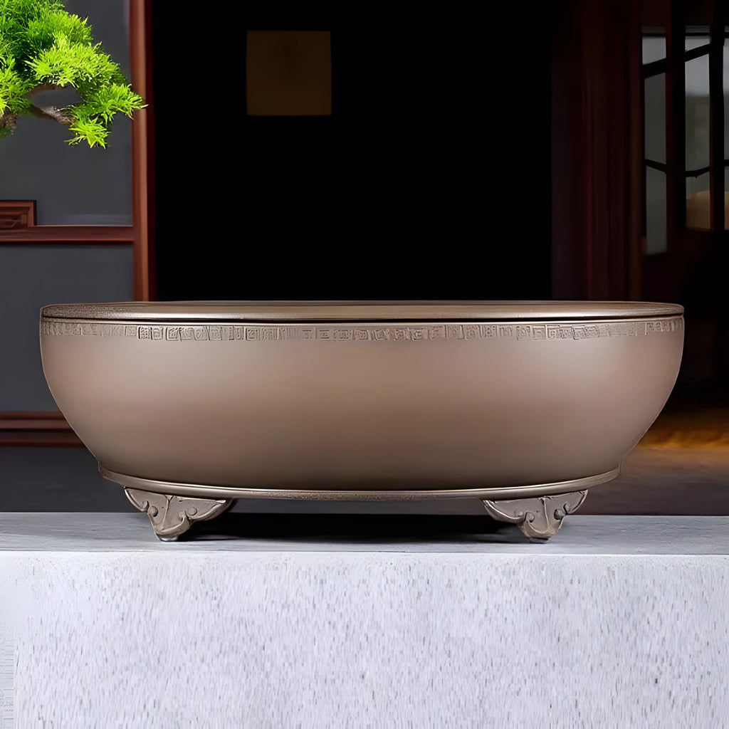 Handmade oval purple sand flowerpot in black mud green colour measuring 50x39.5x16cm