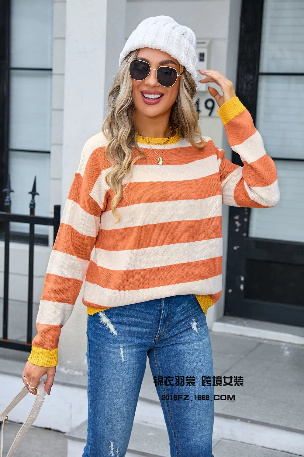 Women's loose fit long sleeve acrylic sweater in blue, round neck