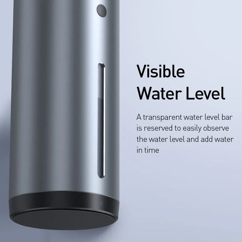 Black aluminium alloy car diffuser humidifier with air purification function on a desktop.