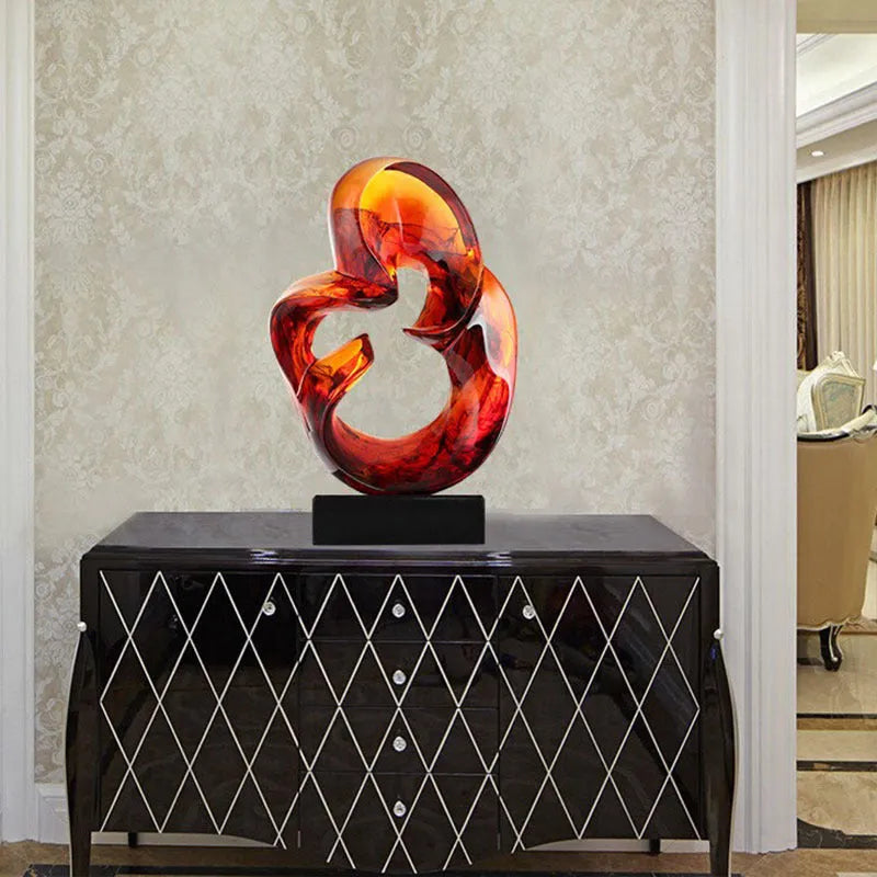 Transparent resin craft ornament in modern simplicity design, shown in orange red and blue colour options