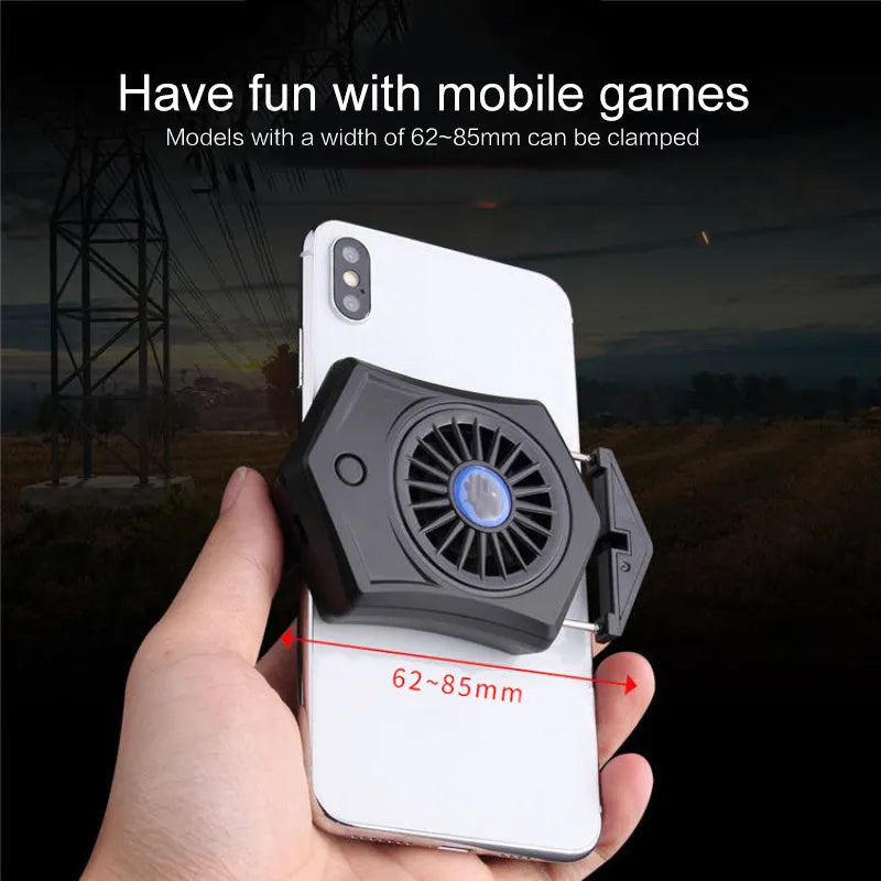 Black mobile phone cooling radiator with USB cable attached to smartphone during gaming