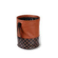 Black leather retractable foldable car trash can with handle shown open and folded.