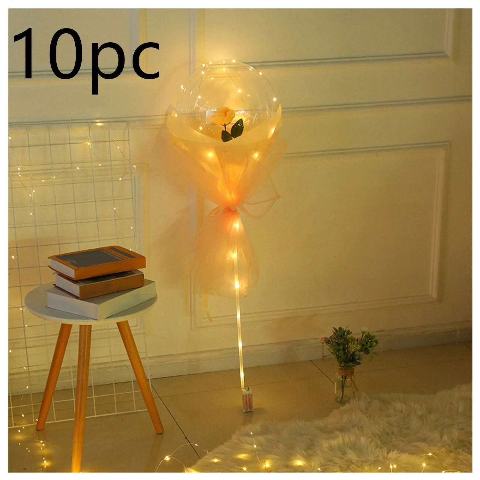 Transparent LED luminous balloon with artificial rose and built-in light, shown as a DIY bouquet kit.