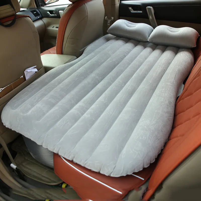 Thick flocking inflatable car air bed set with pump and pillows for five-seater vehicles.