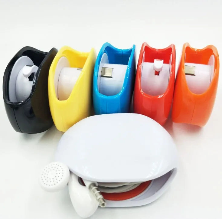 Automatic earphone retractor winder with telescopic reel and small storage box.
