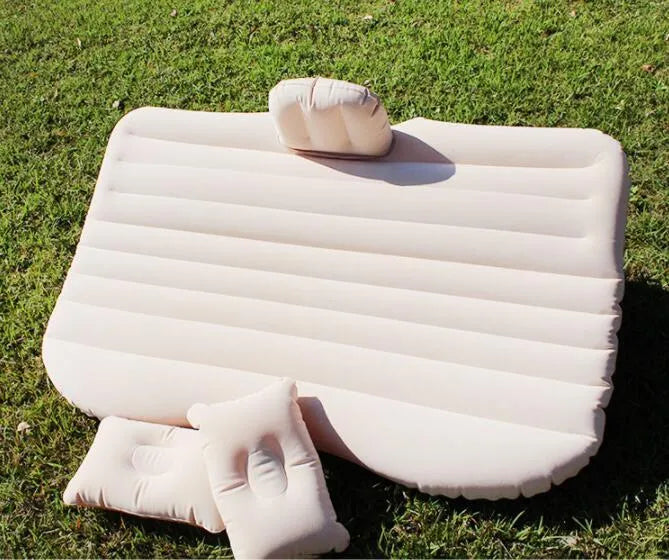 Thick flocking inflatable car air bed set with pump and pillows for five-seater vehicles.